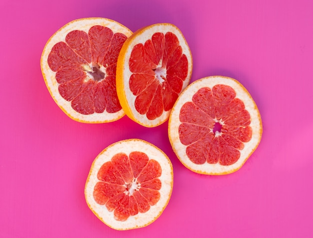 Sliced red grapefruit isolated top view