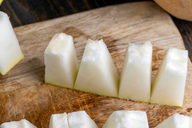 Sliced ripe melon juicy melon divided into pieces during cooking