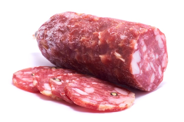 Sliced smoked dry salami sausage isolated on white background