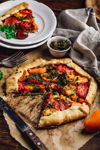 Sliced tomato galette on baking paper