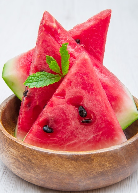 Sliced watermelon on white marble table