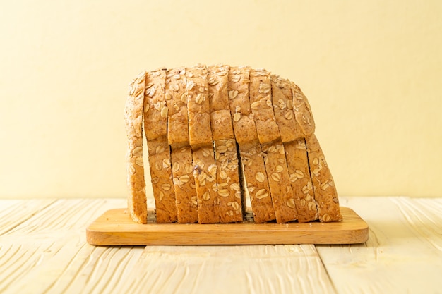 sliced wholegrain bread on a wooden table