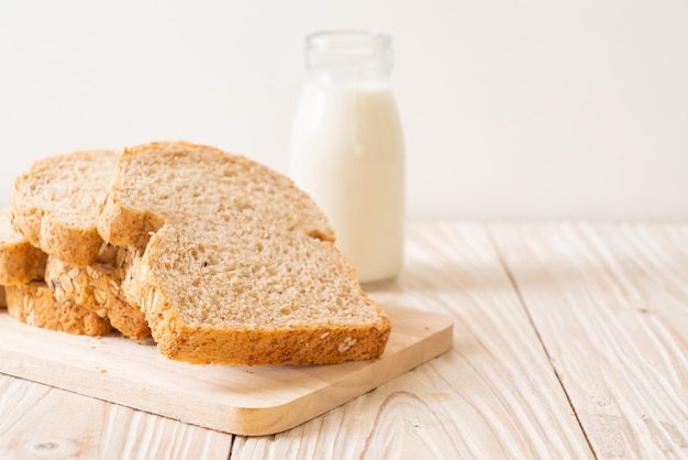 sliced wholegrain bread on a wooden table