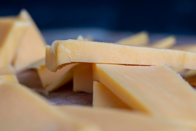 Sliced yellow cheese made from cow's milk