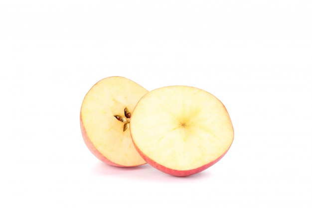 Slices of apple on white table