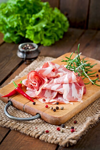 Slices of bacon with herbs and spices