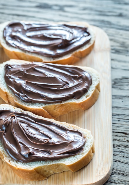 Slices of baguette with chocolate cream