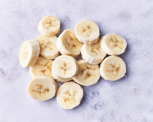 Slices of banana on a marble table