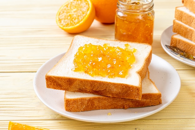 Slices of bread with orange jam