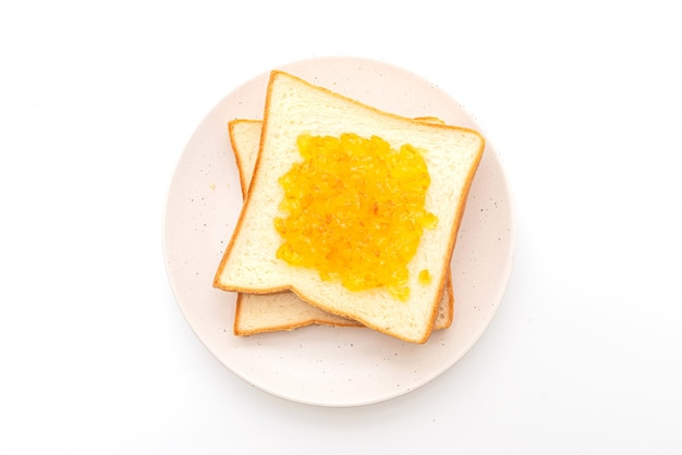 Slices of bread with orange jam