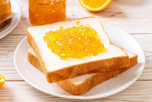 Slices of bread with orange jam