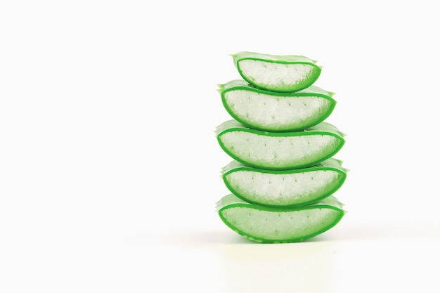 Slices of fresh aloe vera plant stacked with water dropping isolated on white background.