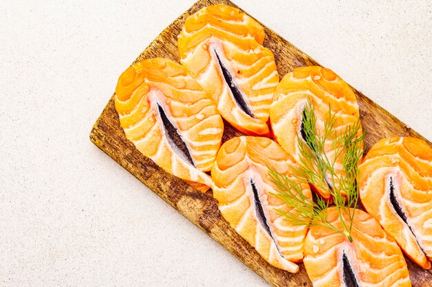 Photo slices of fresh salmon. ingredient for cooking healthy seafood.