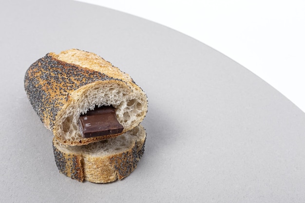 Slices of Homemade Seed Bread with a chocolate bar from above