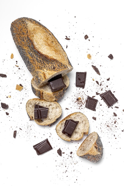 Slices of Homemade Seed Bread with a chocolate bar from above