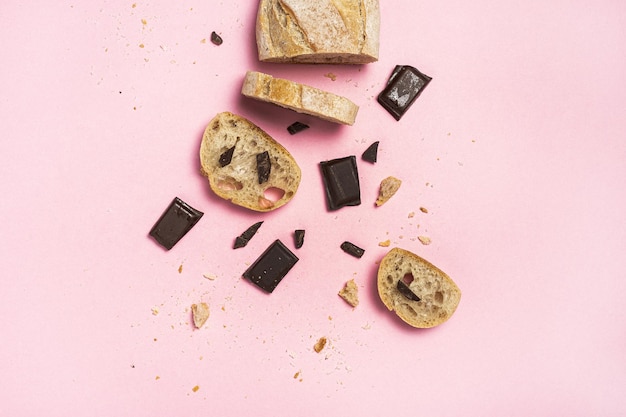 Slices of Homemade Seed Bread with a chocolate bar from above