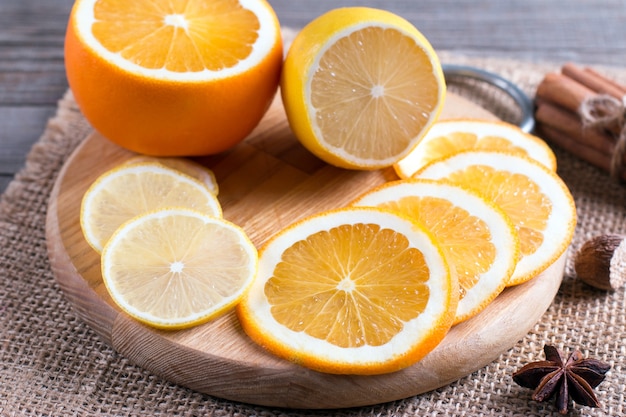 Slices of orange and lemon on a cutting board