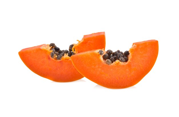 Slices of sweet papaya on white background