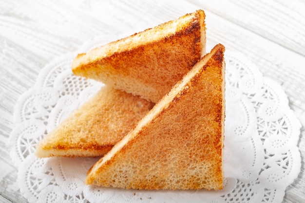 Slices of toast bread on a light background