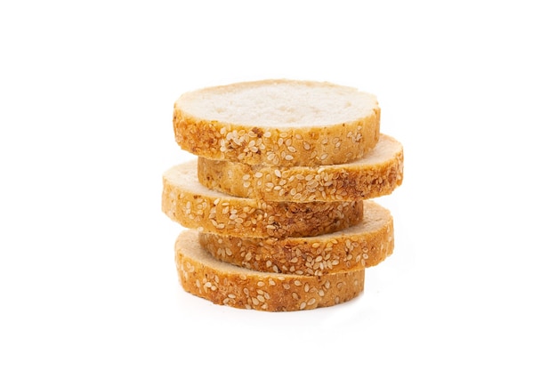 Slices of white bread or a loaf with sesame seeds isolated on a white background.