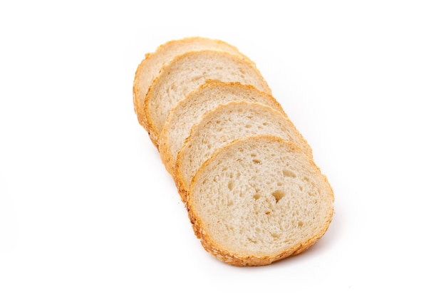 Slices of white bread or a loaf with sesame seeds isolated on a white background.