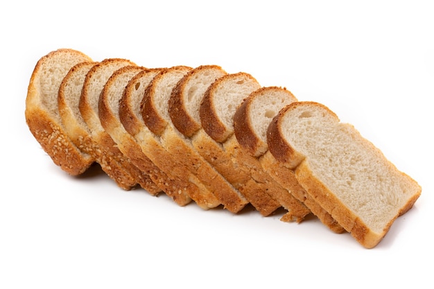 Slices of white bread or a loaf with sesame seeds isolated on a white background.