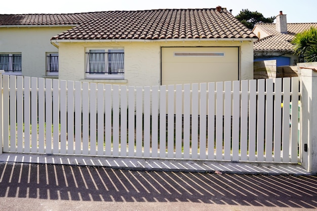 Slide classic white door aluminum home gate large beige portal of suburbs house