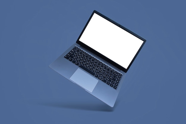 Slim modern laptop with white screen mockup on gray  with shadow.