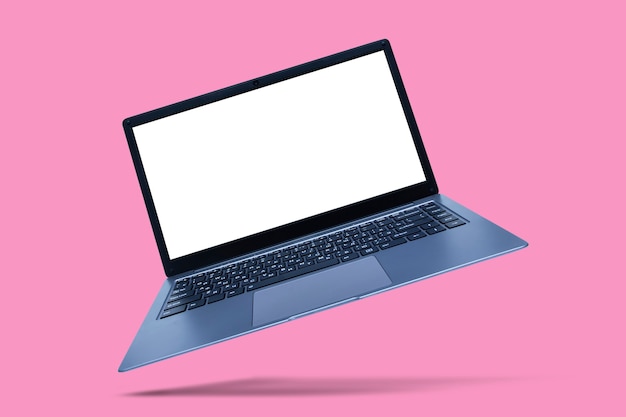 Slim modern laptop with white screen mockup on pink  with shadow.