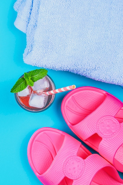 Slippers, a towel and an ice cocktail