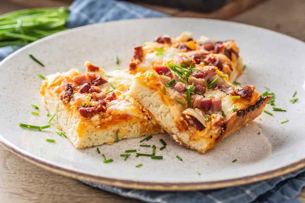 Slovak national dish podpecnik podplamennik or posuch Slovak national dish is made sourdough bryndza sour cream bacon and onion