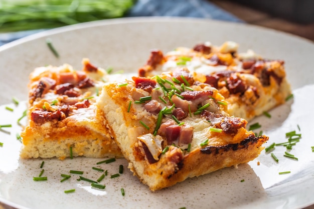 Slovak national dish podpecnik podplamennik or posuch Slovak national dish is made sourdough bryndza sour cream bacon and onion