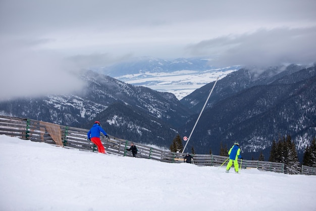 Slovakia Jasna February 4 2022 people skiers eating on the top of the slope