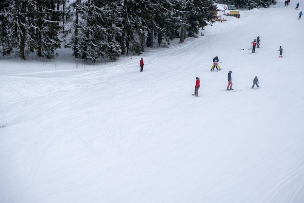 Slovakia Jasna February 4 2022 people skiers eating on the top of the slope