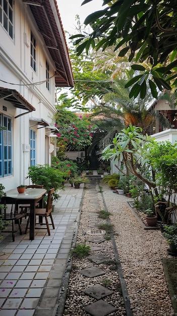 a small alley with a table and chairs and a sign that says  no