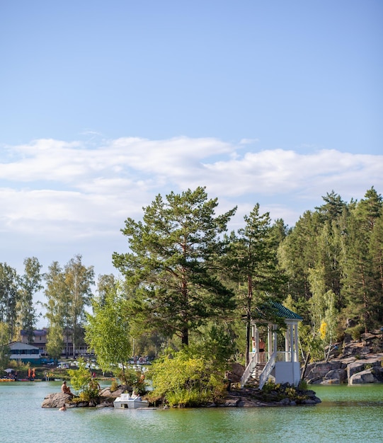 A small beautiful island on Lake Aya in the Altai Territory or the Altai Republic. People relax