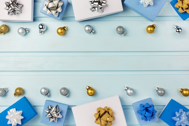 small blue and white decorative boxes on wood background