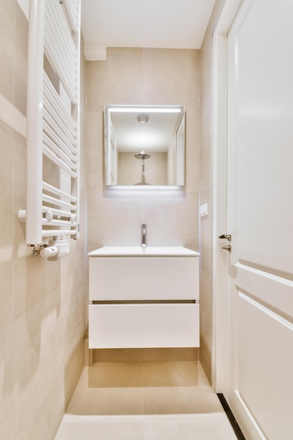 Small bright washroom with a wall-hung sink