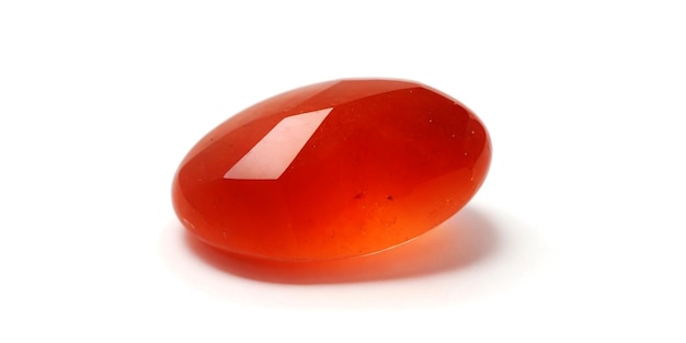 small carnelian stone macro isolated on white background