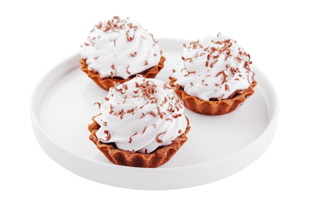 Small chocolate tarts with whipped cream