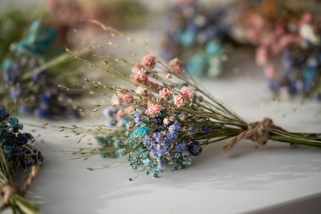 Small cute beautiful bouquets of dried flowers