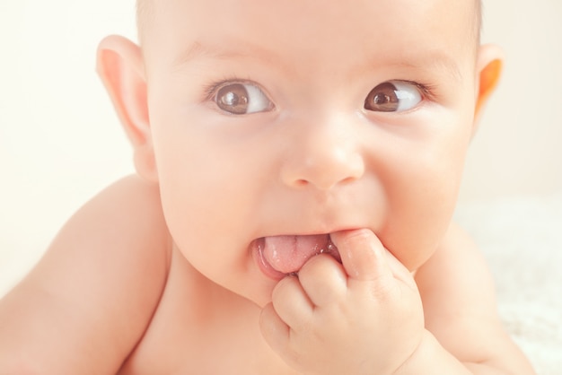 Small cute newborn baby infant teething