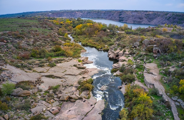 A small fast waterfall Kamenka in the wilderness in the evening light in Ukraine.