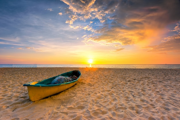 Small Fishing boat with Fishnet on the topical beach in Phuket