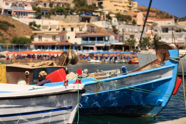 Small fishing boats at pier in fishing village named Bali