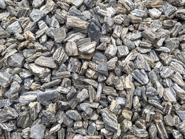 Photo small gray rocks ground seamless texture for design