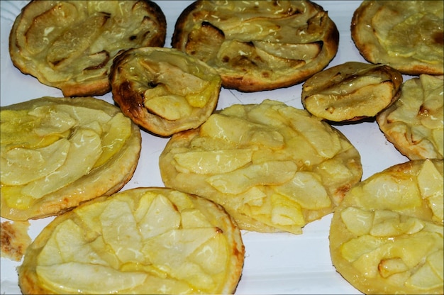 Small homemade apple tarts on the kitchen table