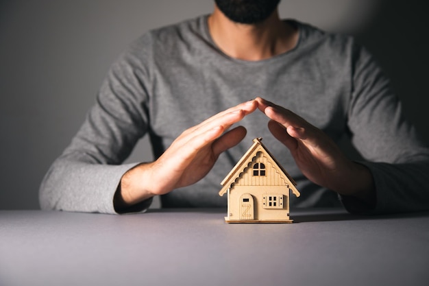 Small house toys in hands