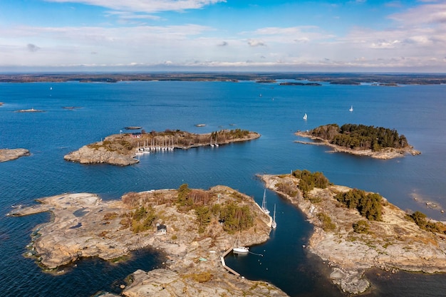 Small island with a sailboat harbor in finland