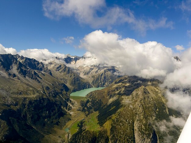 A small lake in the middle of the mountains